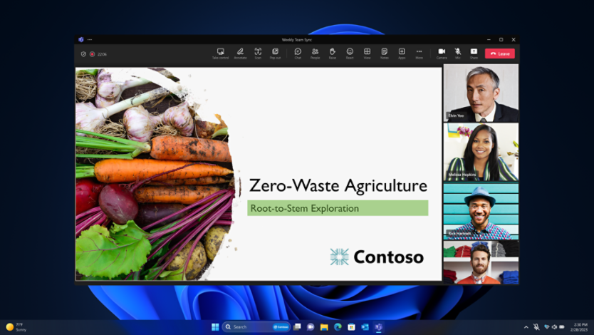 Close-up of icon tray in taskbar with the microphone symbol lit up.