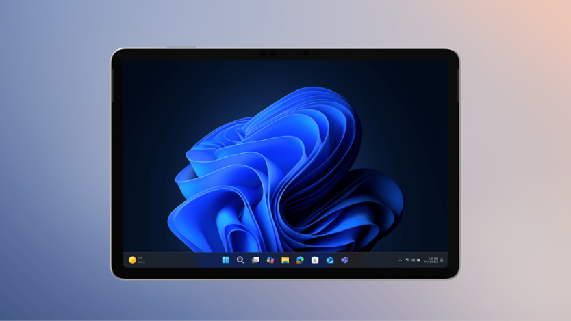2-in-1 device with the Microsoft blue bloom on home screen