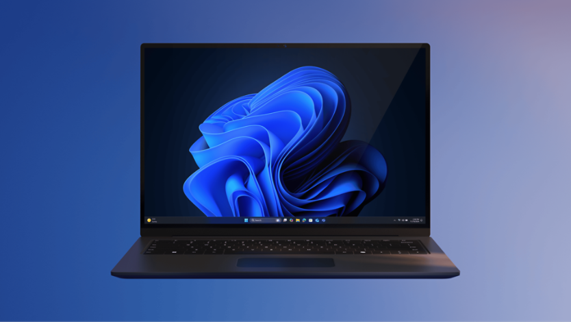A laptop device with the Microsoft blue bloom on home screen